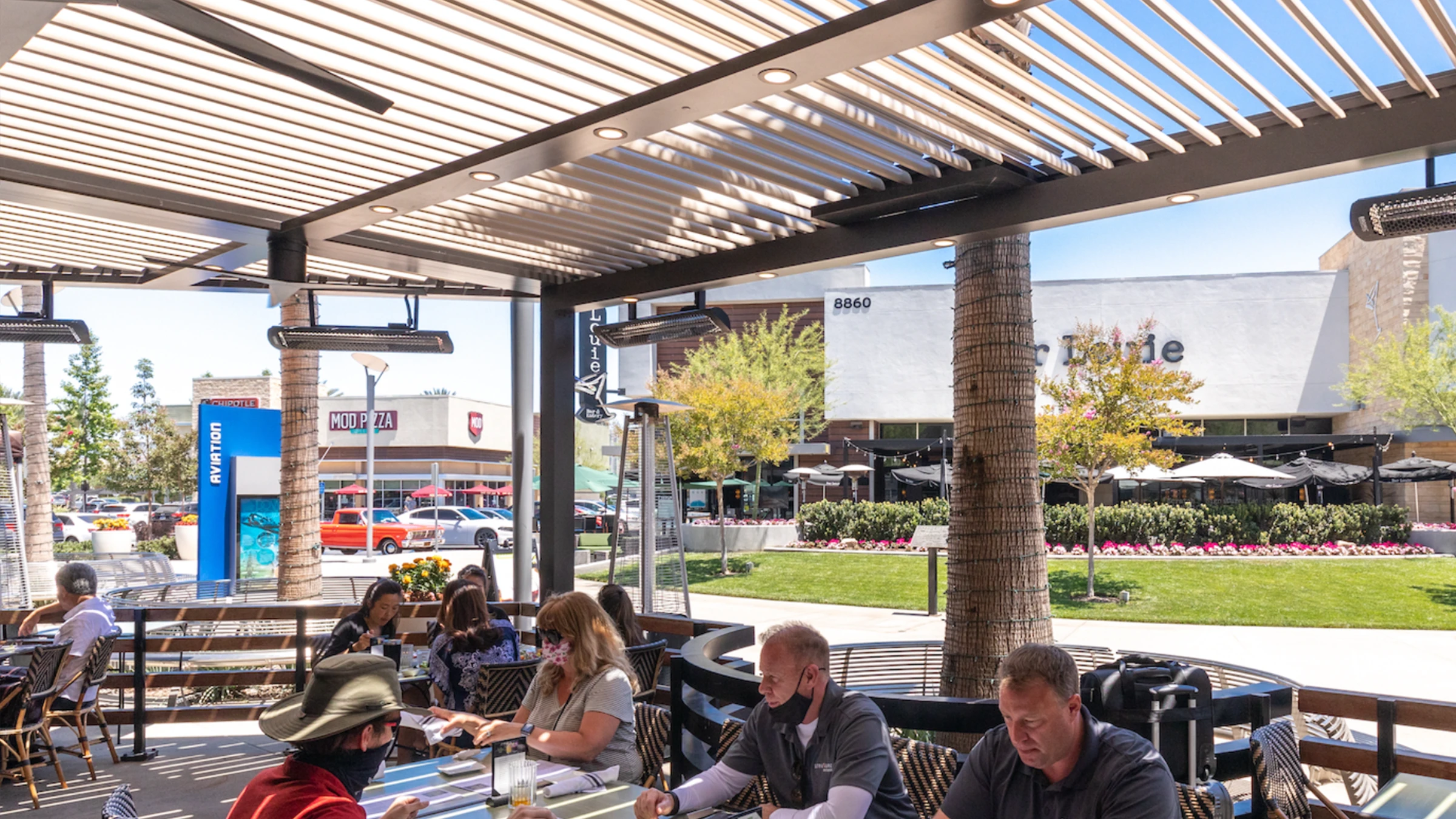 Refined Outdoor Dining with Smart Pergola Shade projects commercial refined-outdoor-dining-with-smart-pergola-shade